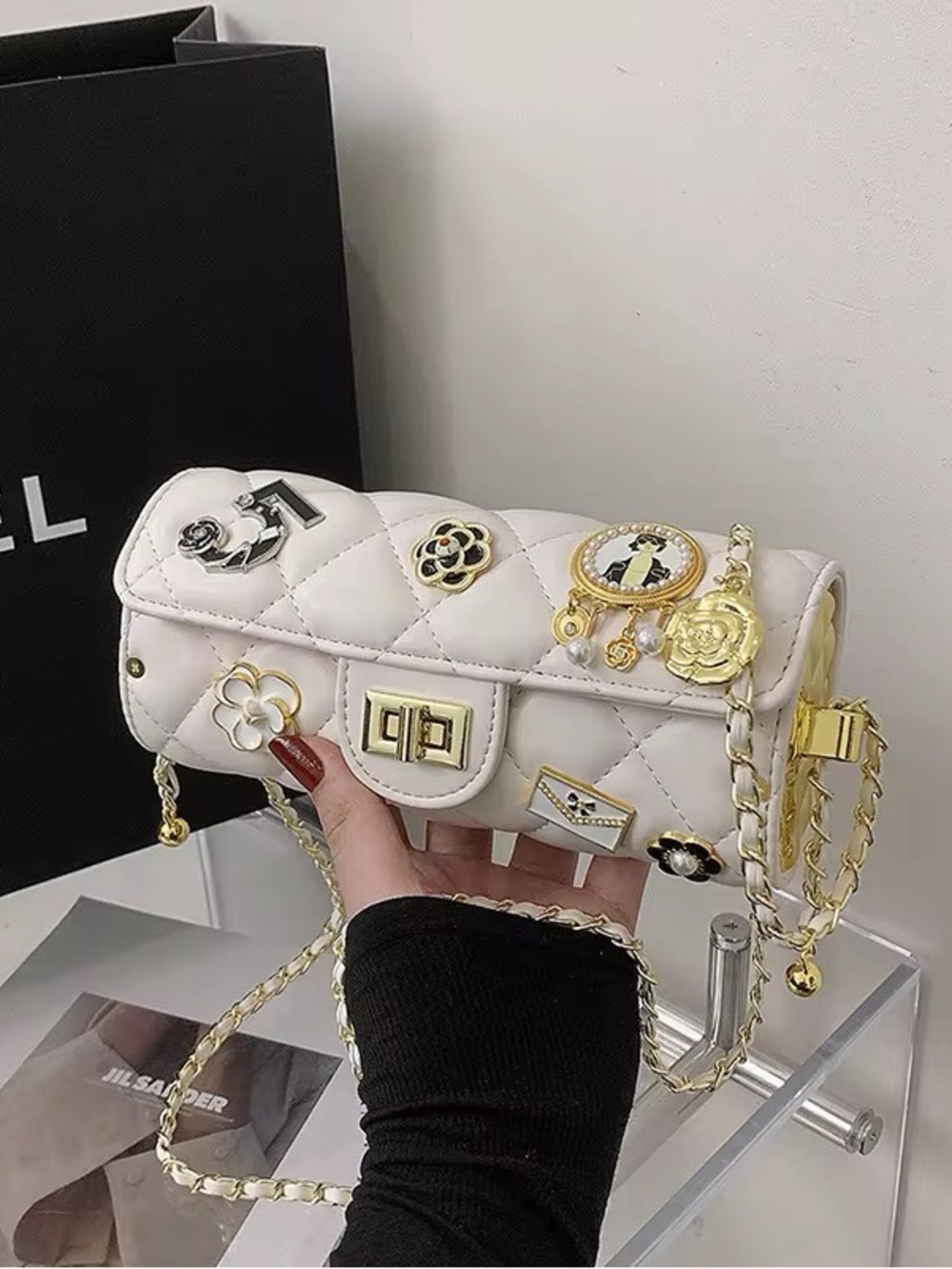 Quilted White Shoulder Bag with Gold Charms